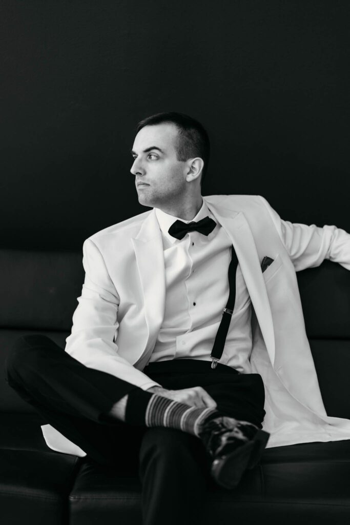 portrait of a groom in wedding studio long island