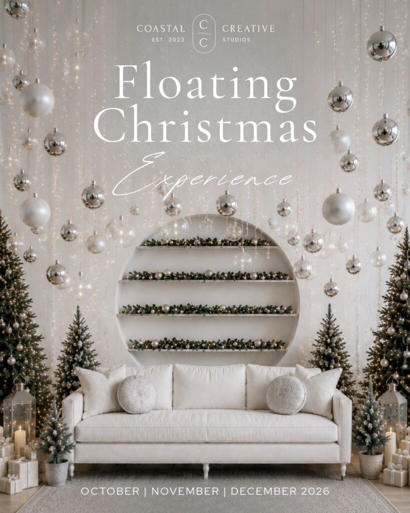 Floating Christmas photo set with white backdrop and hanging ornaments at Coastal Creative Studios in Huntington, NY